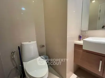 Modern bathroom with sleek fixtures and neutral tones