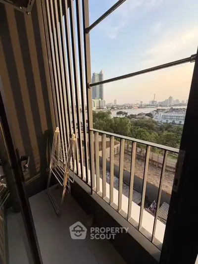 Charming balcony with stunning cityscape view, perfect for relaxation and enjoying sunsets.