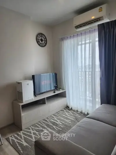 Cozy living room with modern decor and natural light