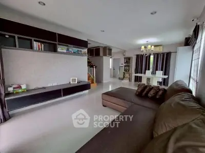 Spacious modern living room with elegant decor and ample natural light