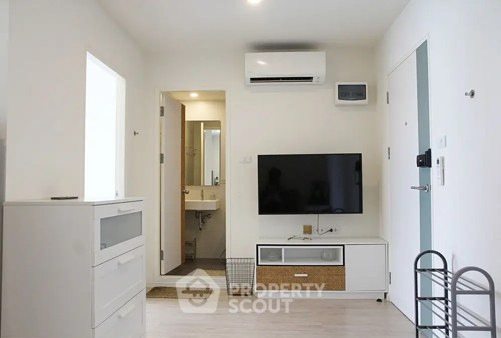 Modern living room with sleek TV setup and minimalist decor