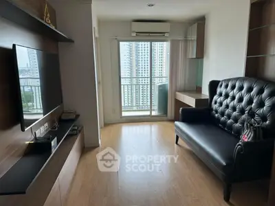 Modern living room with sleek furniture and city view balcony