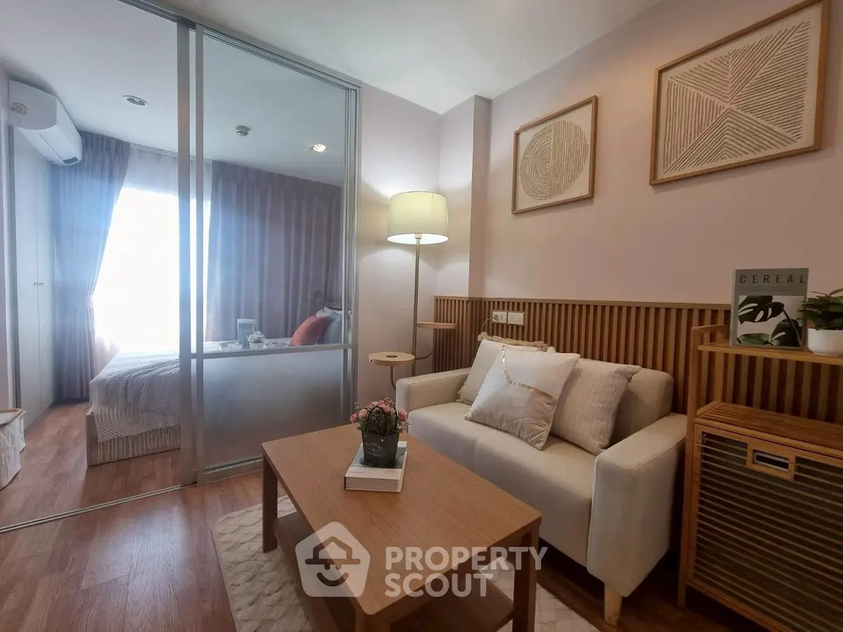 Cozy living room with modern decor and natural light in stylish apartment