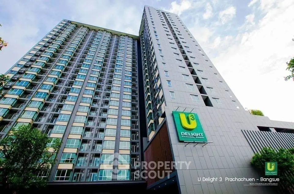 Modern high-rise condominium complex with lush greenery, showcasing urban living with a touch of nature, ideal for city dwellers.