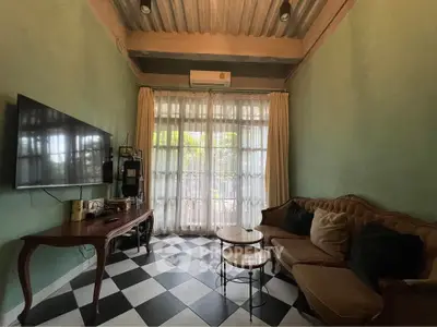 Charming living room with vintage decor and natural light