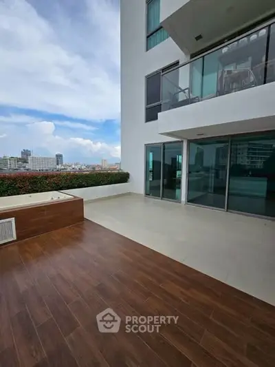 Spacious modern balcony with city view in luxury apartment