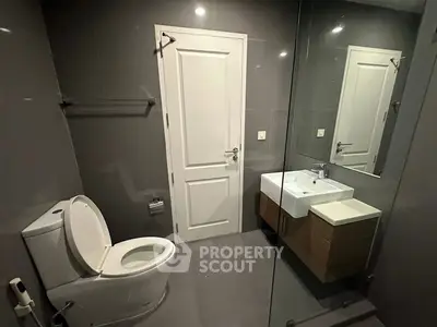 Modern bathroom with sleek design and glass shower enclosure