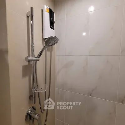 Modern bathroom shower with sleek design and water heater