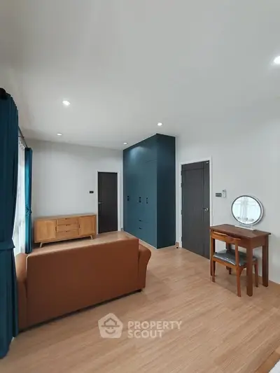 Spacious living room with modern furniture and elegant decor