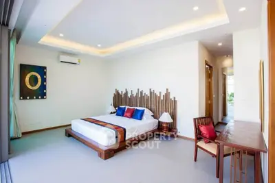 Luxurious modern bedroom with stylish decor and ambient lighting