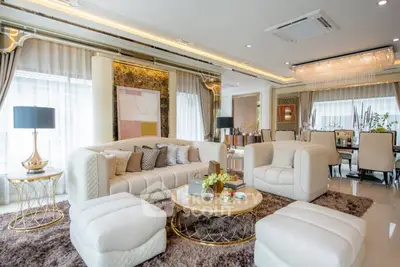 Luxurious living room with elegant decor and plush seating in a modern home