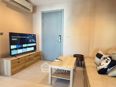 Cozy living room with modern TV and stylish furniture