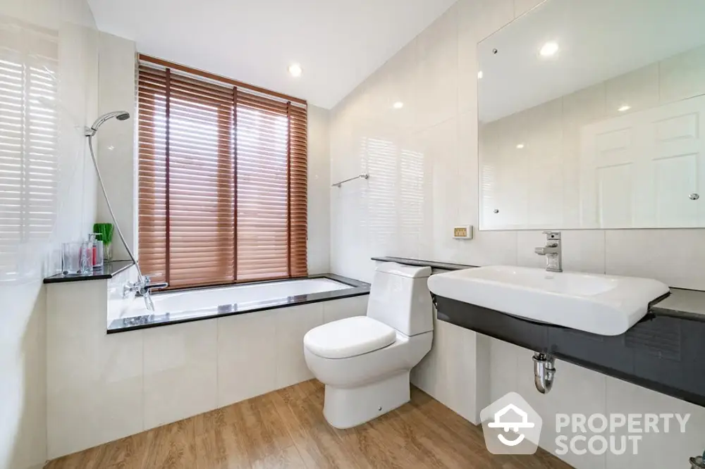 Modern bathroom with elegant bathtub and sleek fixtures