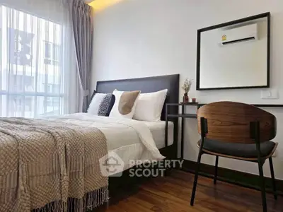 Modern bedroom with cozy decor and natural light