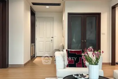 Stylish living room with modern decor and elegant wooden accents