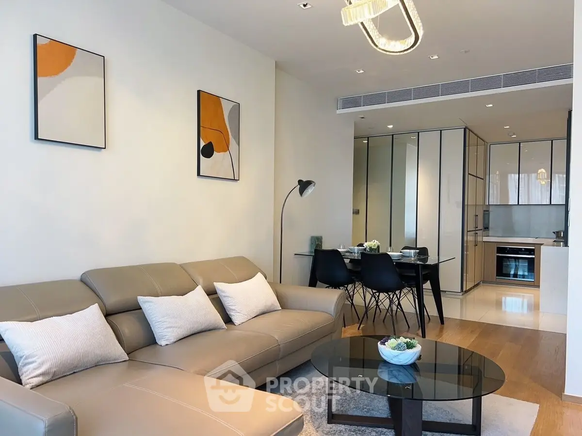 Modern living room with stylish decor and open kitchen layout