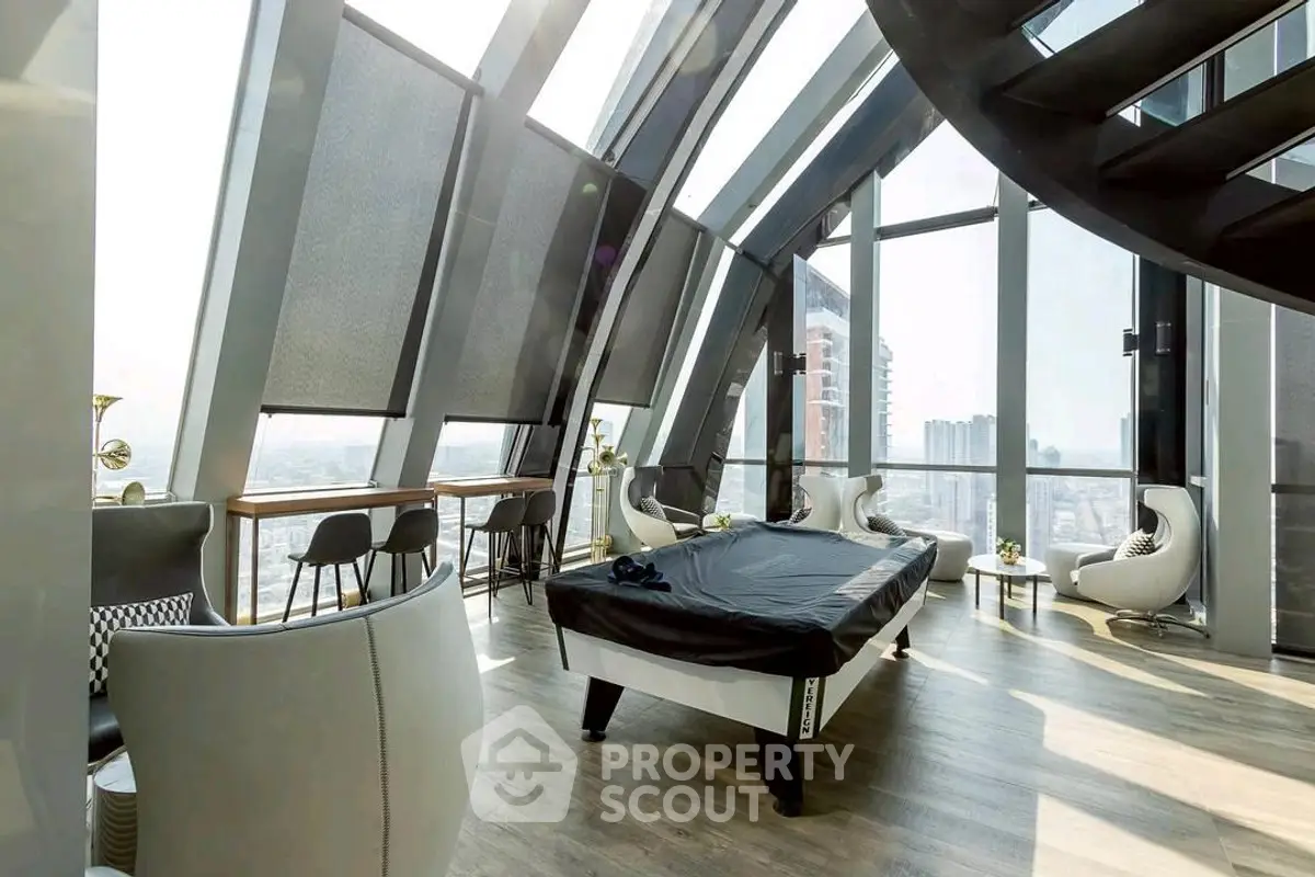 Luxurious penthouse with panoramic city views and modern interior design.