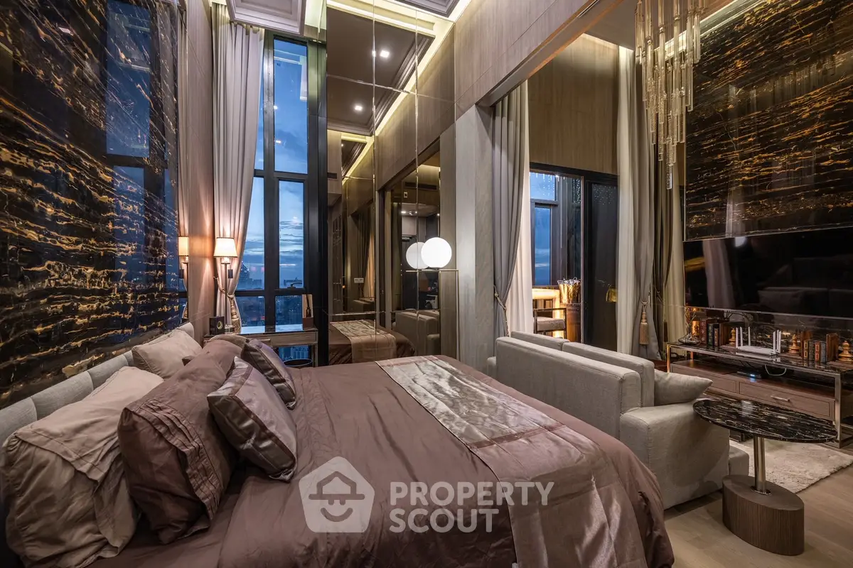 Luxurious bedroom with modern decor and stunning city view