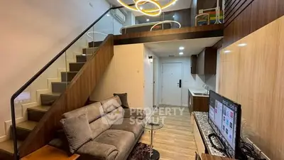 Modern duplex living room with stylish staircase and cozy seating area