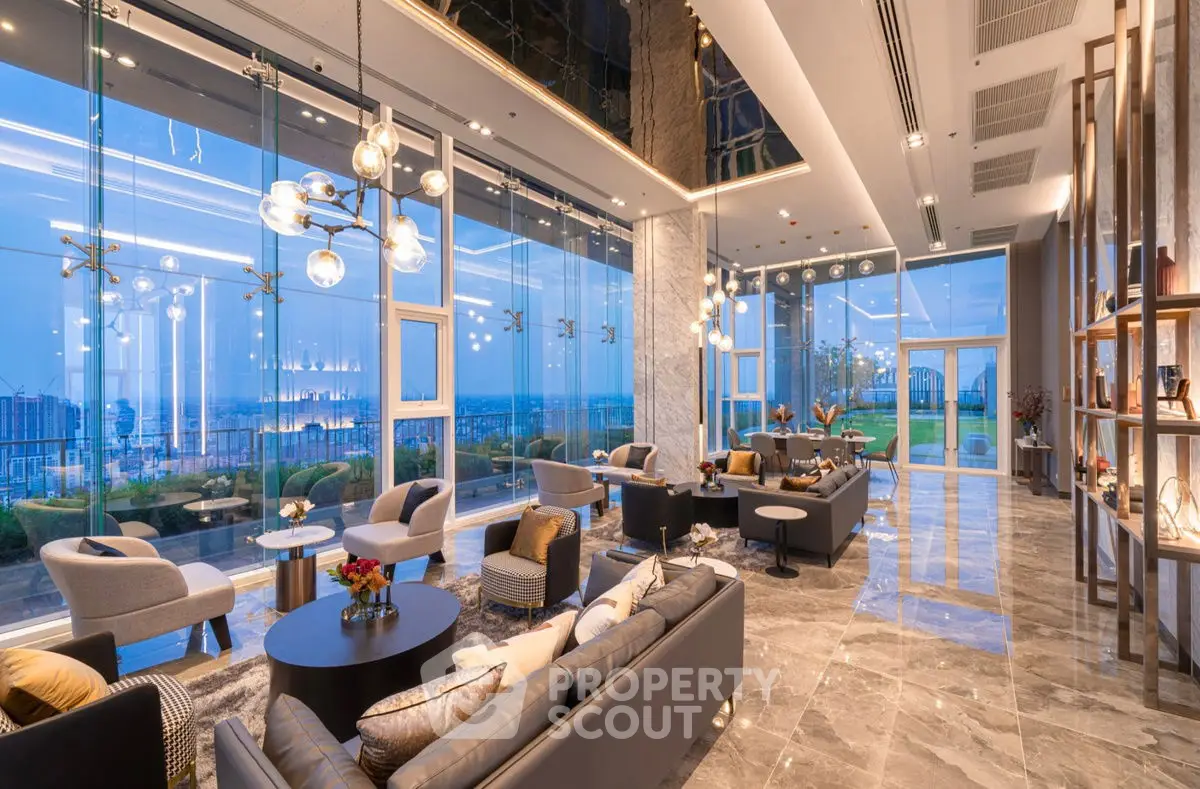 Luxurious modern living room with panoramic city views and elegant decor.