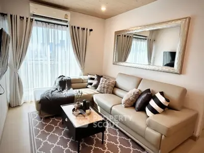 Stylish living room with modern decor and large mirror