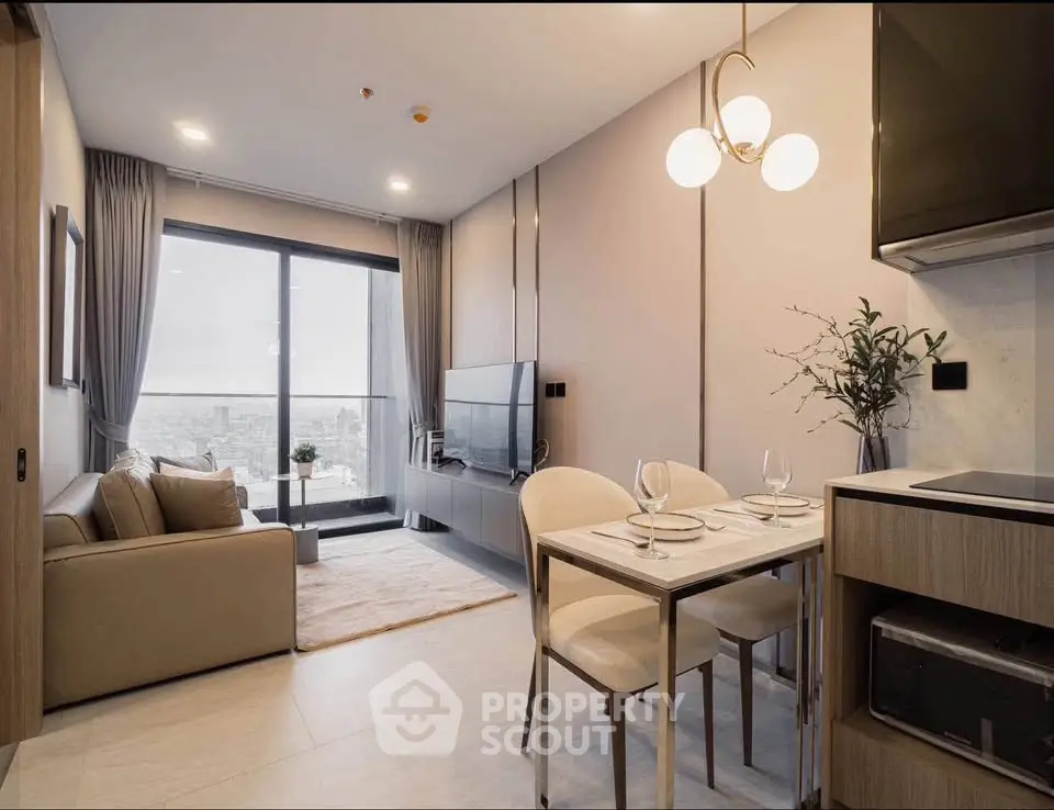 Modern living room with city view, stylish furniture, and elegant lighting in a high-rise apartment.