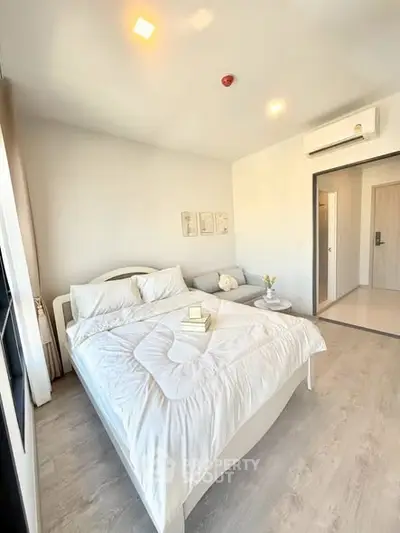 Bright and cozy bedroom with modern decor and natural light