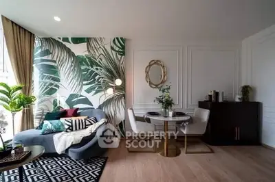Stylish living room with modern decor and tropical accent wall