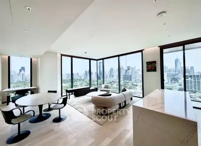 Luxurious modern living room with panoramic city views and elegant furnishings.
