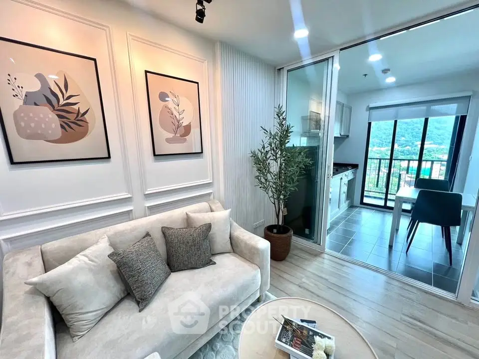 Modern living room with elegant decor and balcony view