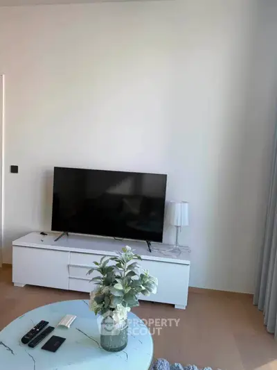 Modern living room with sleek TV setup and stylish decor