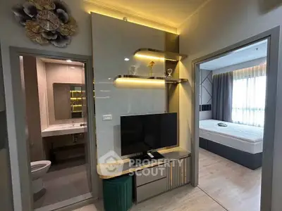 Modern apartment interior with stylish living room and bedroom, featuring sleek design and ambient lighting.