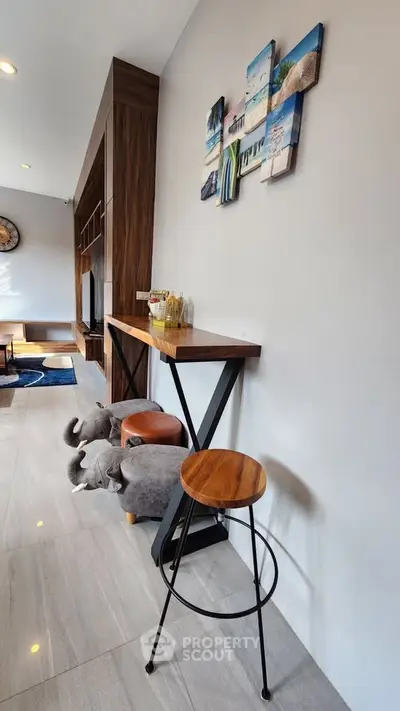 Stylish modern living room with elegant decor and unique furniture pieces.