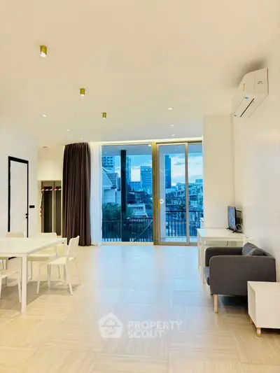 Spacious modern living room with city view and elegant decor