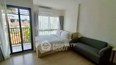 Modern bedroom with balcony view in a stylish apartment