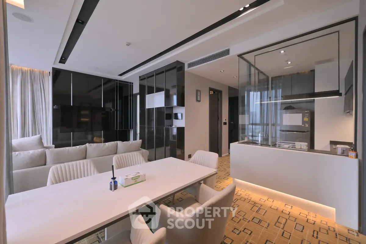 Luxurious modern living room with open kitchen and elegant decor