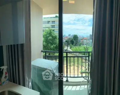 Bright apartment balcony with city view and modern interior design