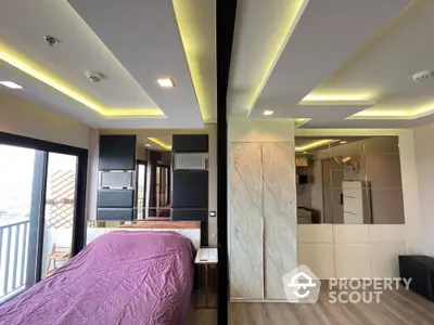 Modern bedroom with stylish ceiling lights and balcony access