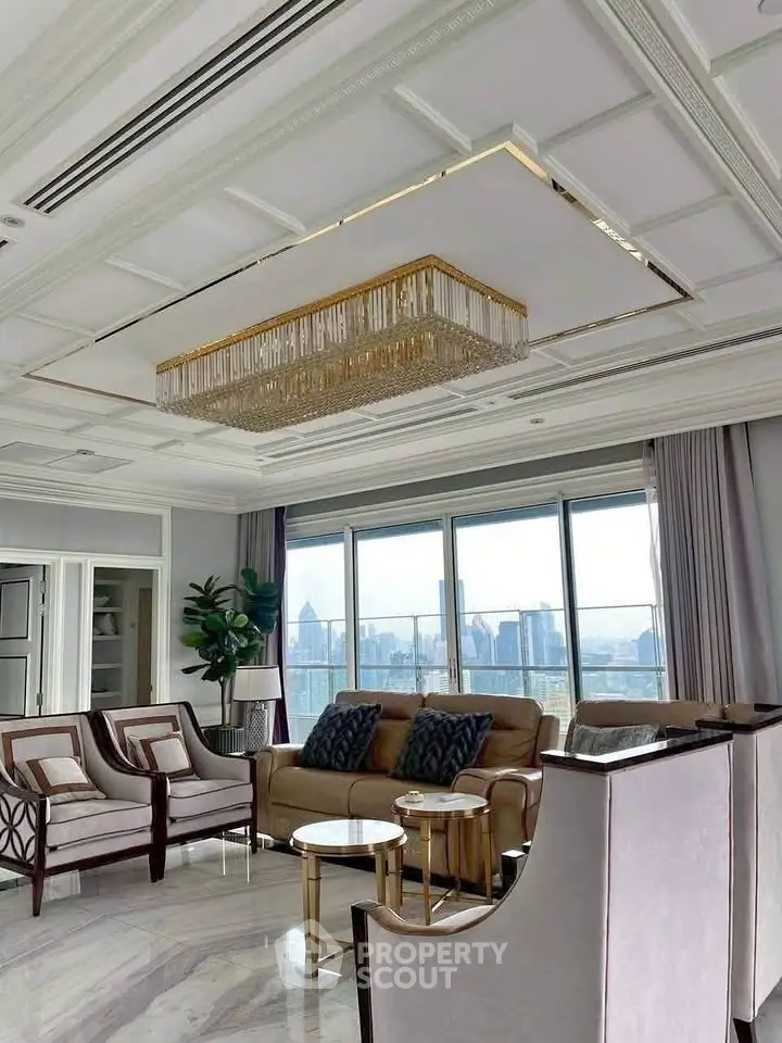 Luxurious living room with elegant chandelier and stunning city view