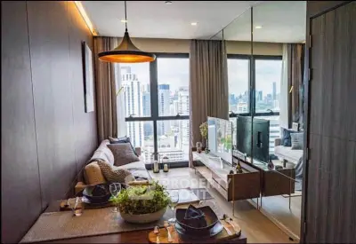 Stylish modern living room with city view, featuring cozy seating and elegant decor.