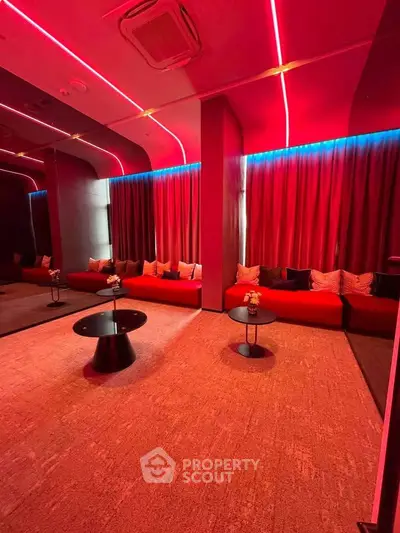 Luxurious modern lounge with ambient lighting and plush seating