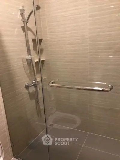 Modern bathroom with sleek shower design and elegant tile work