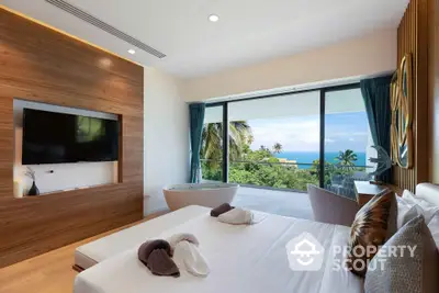 Luxurious bedroom with ocean view and modern decor