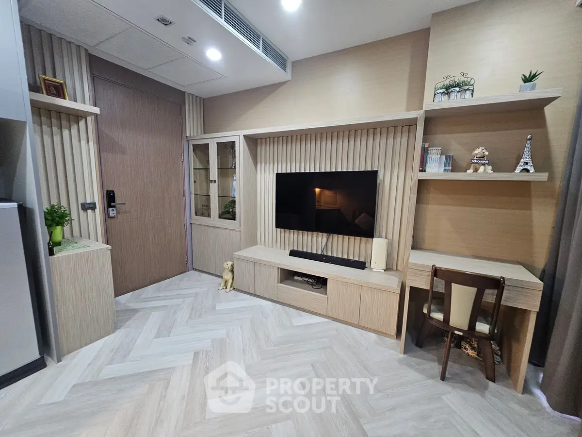 Modern living room with stylish wooden decor and built-in TV unit