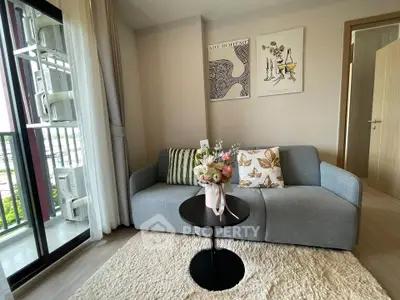 Chic modern living room with cozy sofa and balcony view in stylish apartment