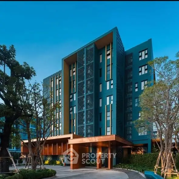 Modern architectural building with sleek design and lush landscaping