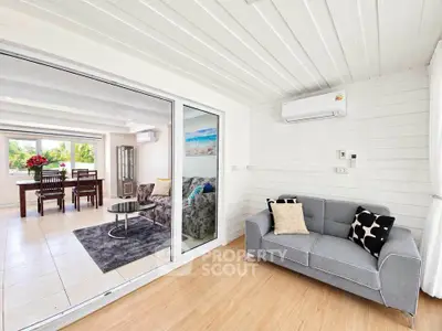 Bright and airy living room with modern decor and large windows