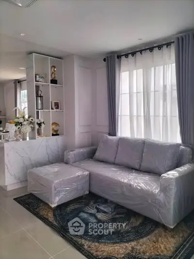 Modern living room with marble accents and stylish decor