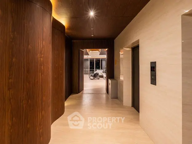 Luxurious modern hallway with elegant wood paneling and ambient lighting