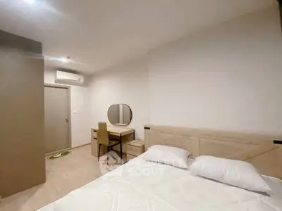 Modern bedroom with minimalist decor and cozy ambiance